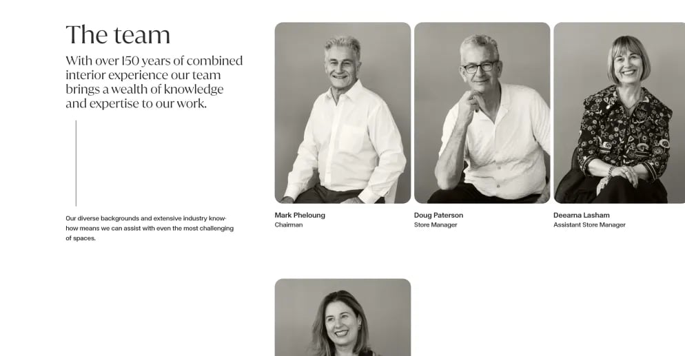 A luxury, minimalist team page layout featuring high-contrast black-and-white portraits of corporate executives with an asymmetrical grid alignment and substantial white space.